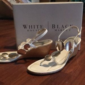 Pair of white wedge sandals. Very comfy!